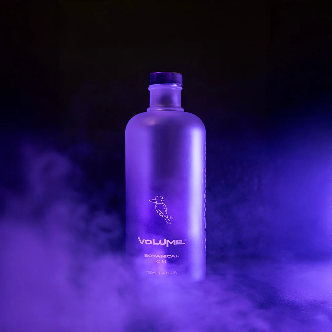 Volume Botanical Gin in pink smoke